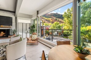 The warm and welcoming decor combined with the beautiful natural scenery creates an idyllic vacation retreat experience.