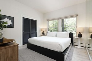 Sleep well in this relaxing master bedroom with king bed.
