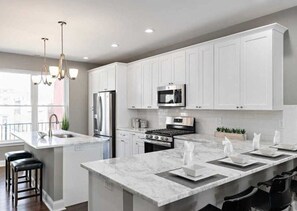 Granite countertops and stainless steel appliances