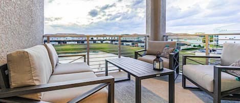 Outdoor Patio area Overlooking pond with Amazing Sunset Views