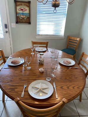 Plenty of room to gather around the dining table for a meal or game night. 