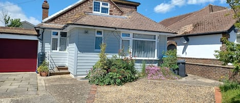 gravel parking in front of house
