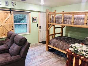 This bunk bed is in the common room.  There are barn doors to close for privacy.