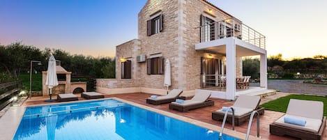 The outdoor pool area to enjoy as dusk falls. 