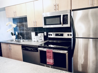 Executive 2 BDR Condo with U/G Parking near ROGERS Place