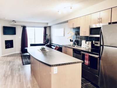 Executive 2 BDR Condo with U/G Parking near ROGERS Place