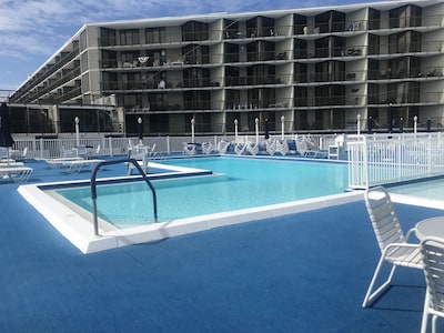 Large one bedroom, one bath condo. Includes pool, gyms parking, steps from beach