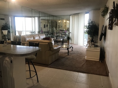 Large one bedroom, one bath condo. Includes pool, gyms parking, steps from beach