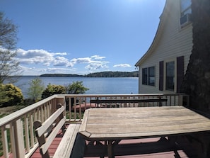 expansive lake and mountain views from deck eating area