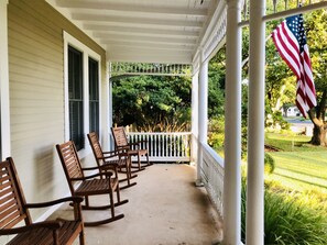 Rock on the porch sipping wine or the drink of your choosing.