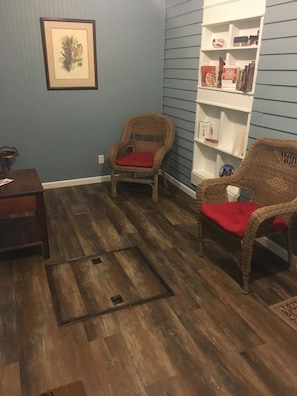 Day room, 1st floor. Access from side door with key code. Kick off shoes here.