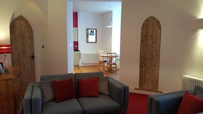 Living area looking through to kitchen dining area.