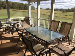 Screened-in porch with beautiful view