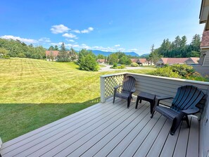 Step outside onto the back deck to soak in the mountain air, fire up the grill, or simply relax while taking in the peaceful golf course views.