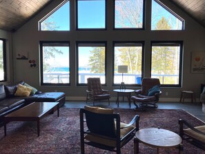 Living area, large windows framing the lake