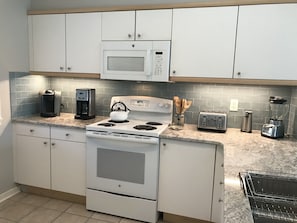 Updated, fully-stocked kitchen