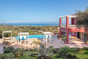 The pool area, with panoramic sea views