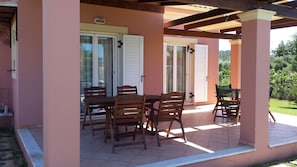 The spacious veranda outside the seating area and the ground floor bedroom 