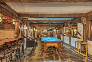 Play a game of pool or simply admire the open wood beams and stone floors.