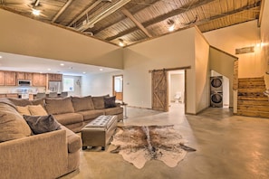 This living area features vaulted ceilings and rustic-chic decor.