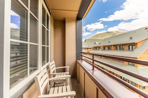 Private balcony with outdoor seating.