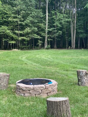 Big backyard for a bonfire and play 