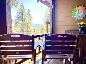 A cozy spot for two or four to take in the view.