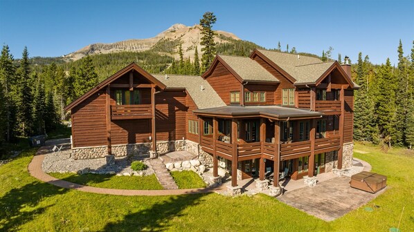 Back of Timber Lodge, showcasing numerous deck and patios spaces