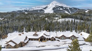 Front of the lodge in wintertime showing the excellent views of Lone Peak!