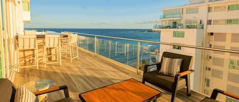 The Expansive Private Terrace Features a Brand New Sofa Set, Bar Stools, &amp; 2 Sun Loungers, purchased in 2024  Looking this Direction you have the Ocean View.