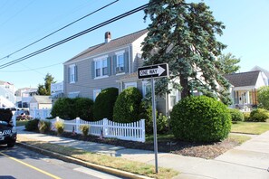 Partially fenced with mature landscaping for privacy.
