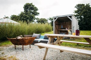 Each Yurt has has its own outdoor area with BBQ/firepit, a food preparation area, wood supply and fire lighting equipment