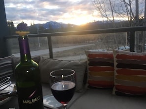Relaxing on our main Patio at sunset with a glass of local U-Brew Wine! CHEERS!