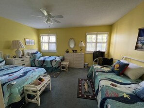 Great kids bedroom with three twin beds plus trundle