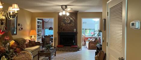 Living room with wood burning fireplace