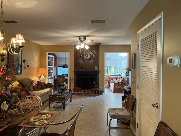 Living room with wood burning fireplace