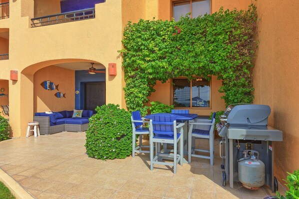 Large Ground Floor patio with plenty of seating and private Grill.