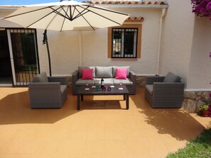 Seating at the rear of the villa
