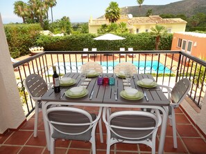 Al fresco dining over looking the pool.