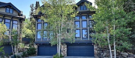 Two 2-Car Garages for Guest Parking Plus Room for More Vehicles in the Driveway