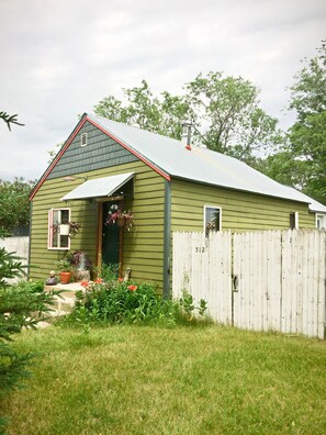 A 6-8 ft' privacy fence surrounds the 5 city lot property. 