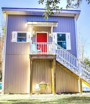 Tiny House Talk 
https://tinyhousetalk.com/cute-quirky-tiny-house-by-the-marsh/