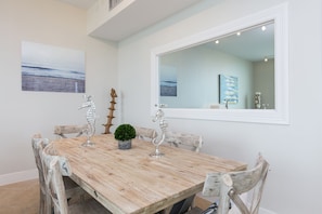 Dining area accommodates 6 guests comfortably.