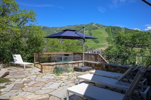 A perfectly private patio awaits with a unbeatable view and lots of seating