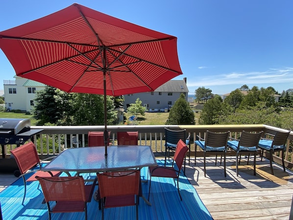 Big (12x24) elevated deck w/ ocean views+access to yard. Grill has been upgraded