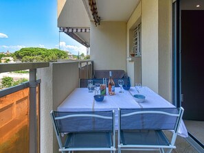 Table, Furniture, Building, Property, Chair, Azure, Shade, Sky, Plant, Interior Design