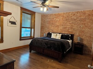 Master bedroom with walk in closet and en suite bathroom