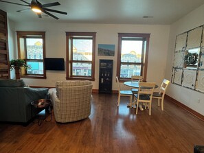 Open concept living room, dining room and kitchen.