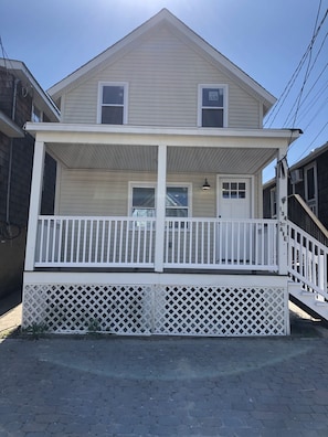 Front porch with (1) dedicated parking space