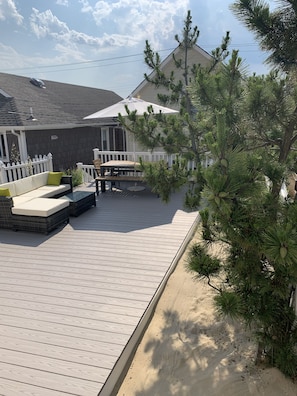 Space for kids to play in sand while you enjoy a drink and large dining area